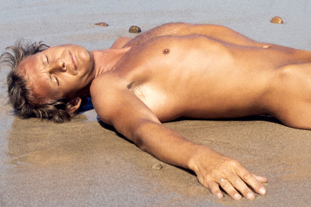 Naked and free in nature - sunbathing on the naturist beach at the Centre Hélio Marin Montalivet on the Atlantic in France